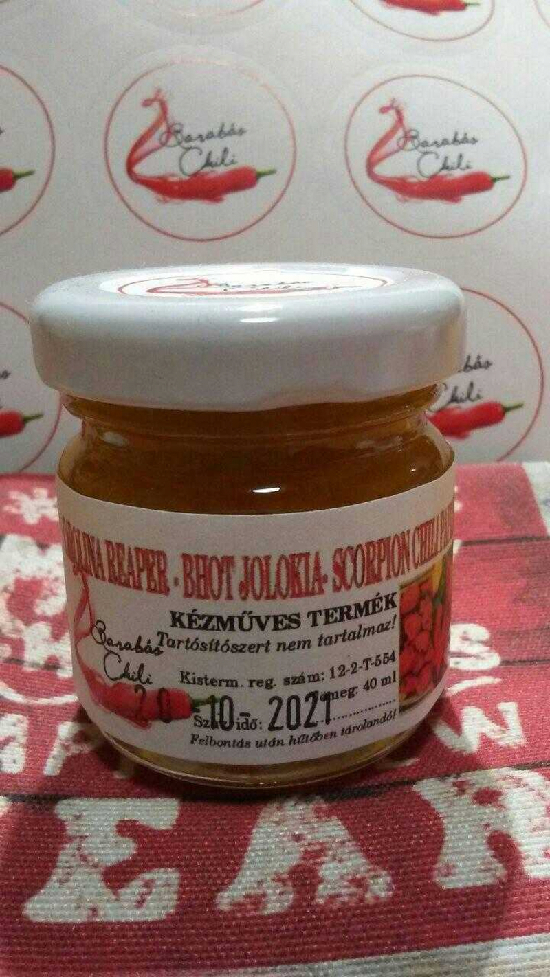 Carolina Reaper+ Bhut Jolokia+ Scorpion Moruga chili paprikákból készült chili szósz.